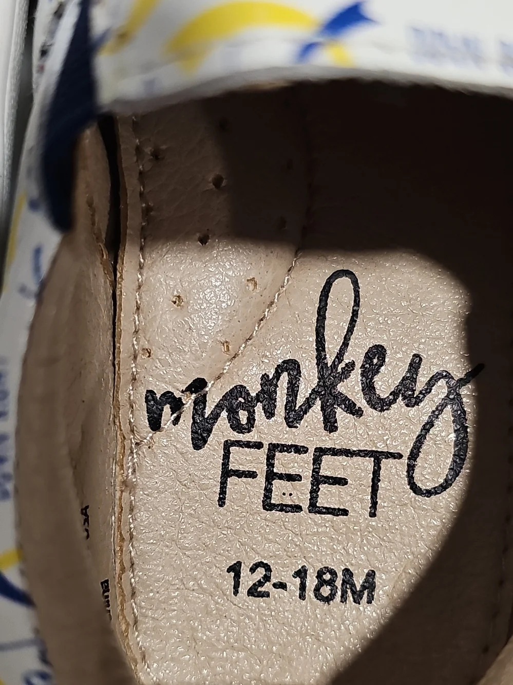 Monkey Feet White Slip-On Sneakers with Blue & Yellow Prints 12-18 Months